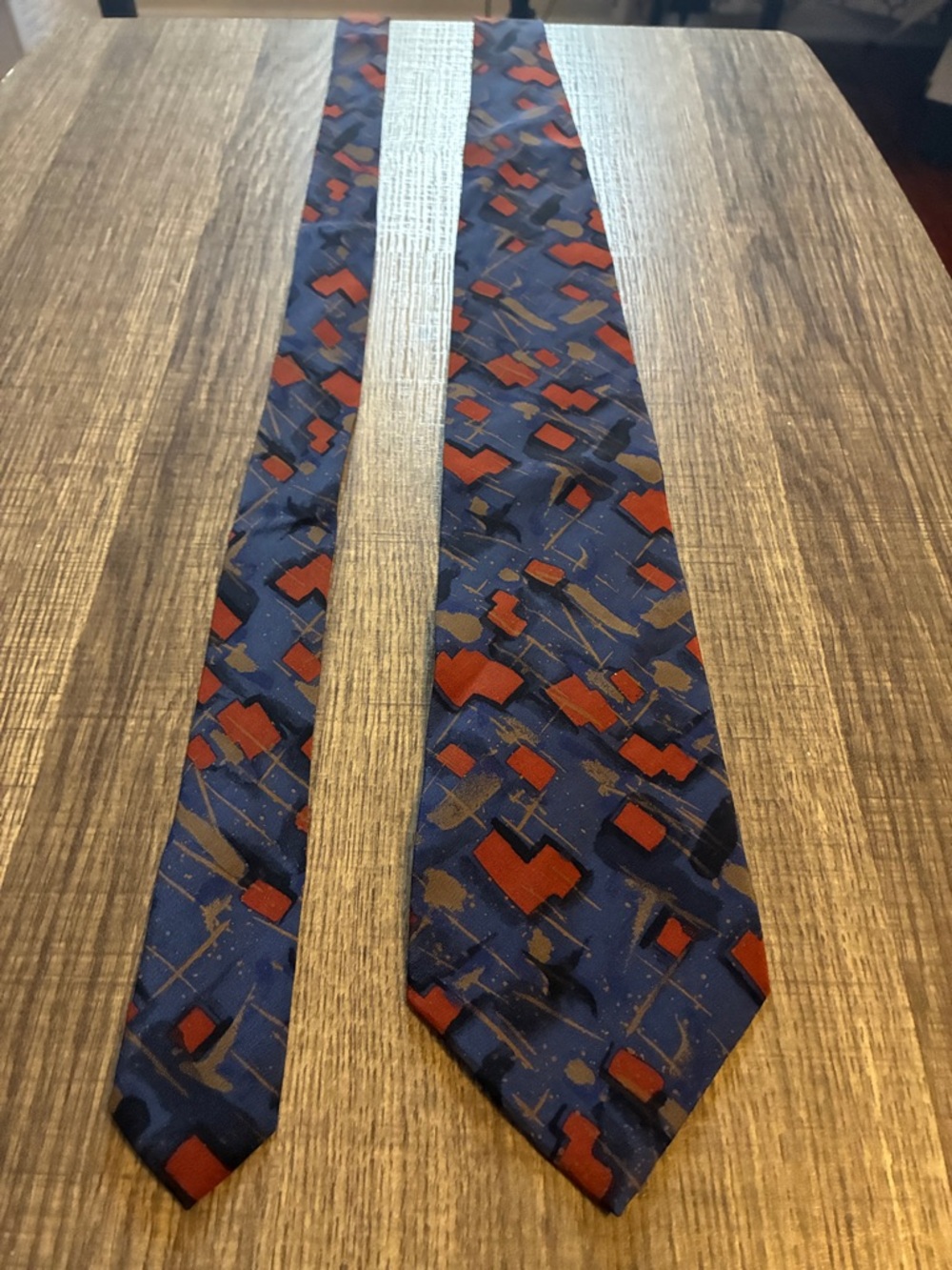 Classic Navy Tie with Rust Geometric Pattern